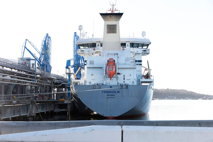 The crew's lifeboat is ready for rapid launch from the aft deck.